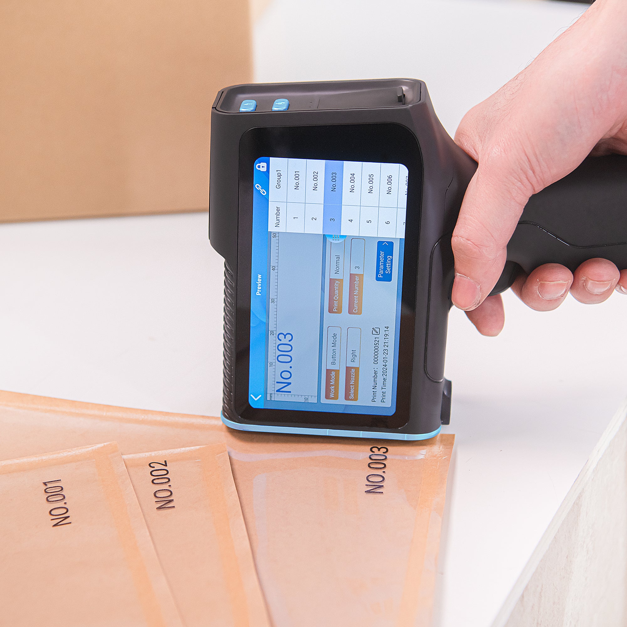 Batch code printer marking sequential serial numbers on packaging