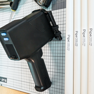 Handheld inkjet printer coding multiple plastic pipes