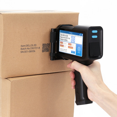 QR code inkjet printer marking batch data on cardboard boxes